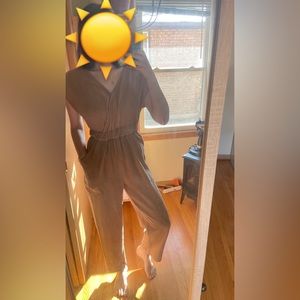 Small, basin range waffle knit tan jumpsuit. 100% cotton.